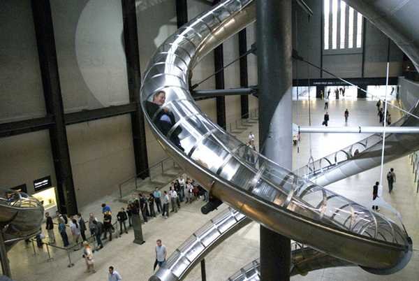 Carsten Höller, Test Site: spiralling tubular slides running from the upper floors down to the Turbine Hall, Tate Modern