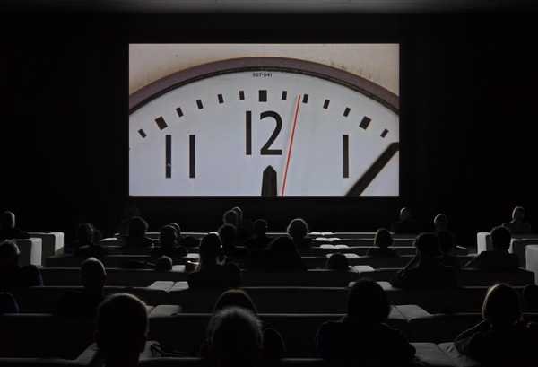 Christian Marclay, The Clock: an old film close up of a clock face, from the 24 hour montage