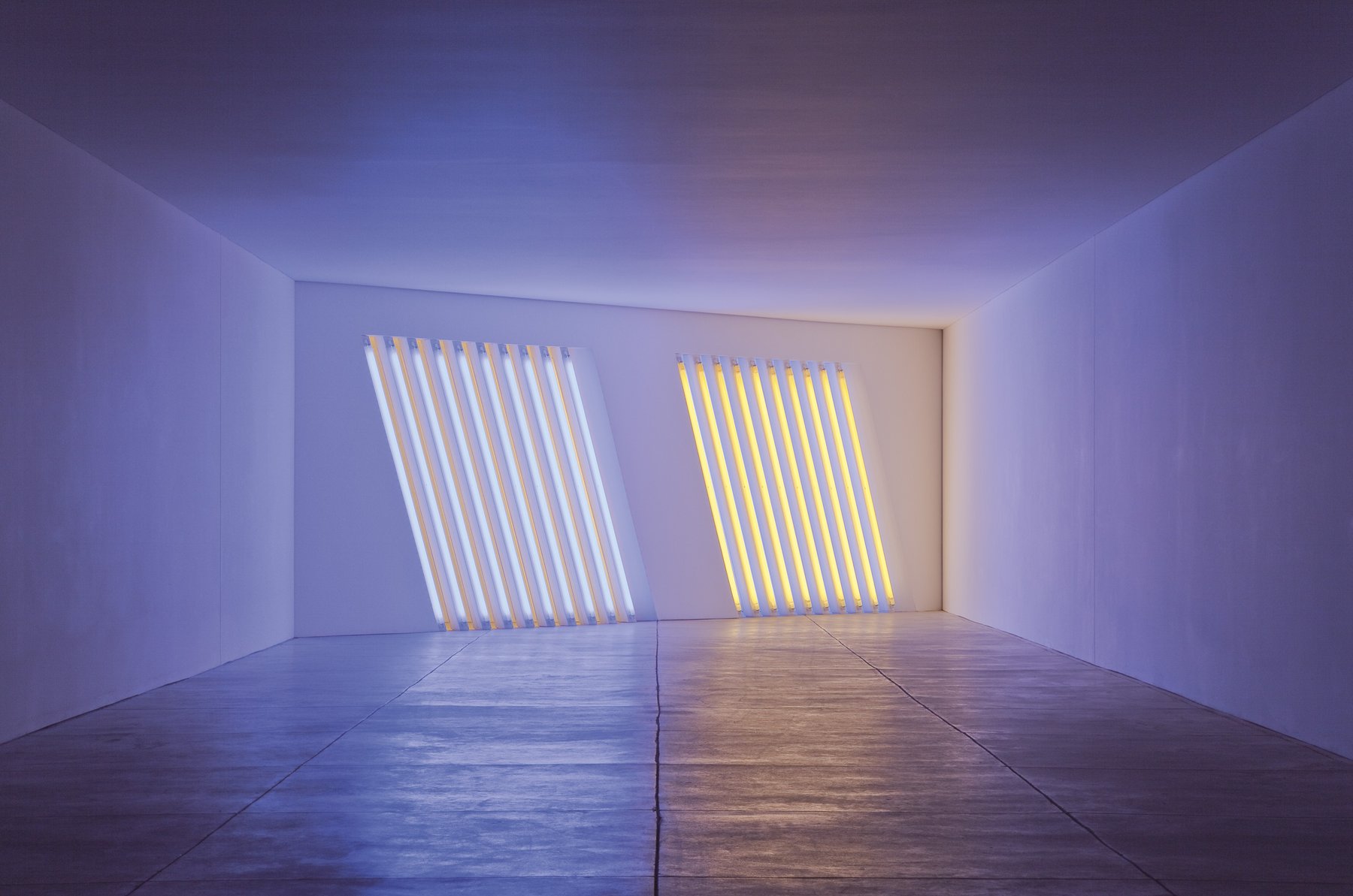 Dan Flavin, untitled (Marfa project): a former barracks corridor blocked by a barrier of coloured fluorescent lights
