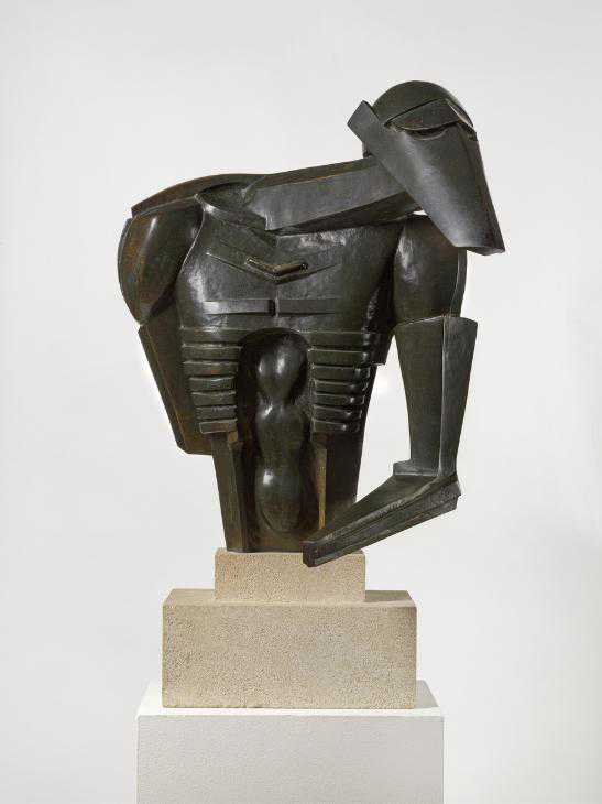 Jacob Epstein, Torso in Metal from The Rock Drill: a bronze half figure of a robot like form with a visored head and a missing arm