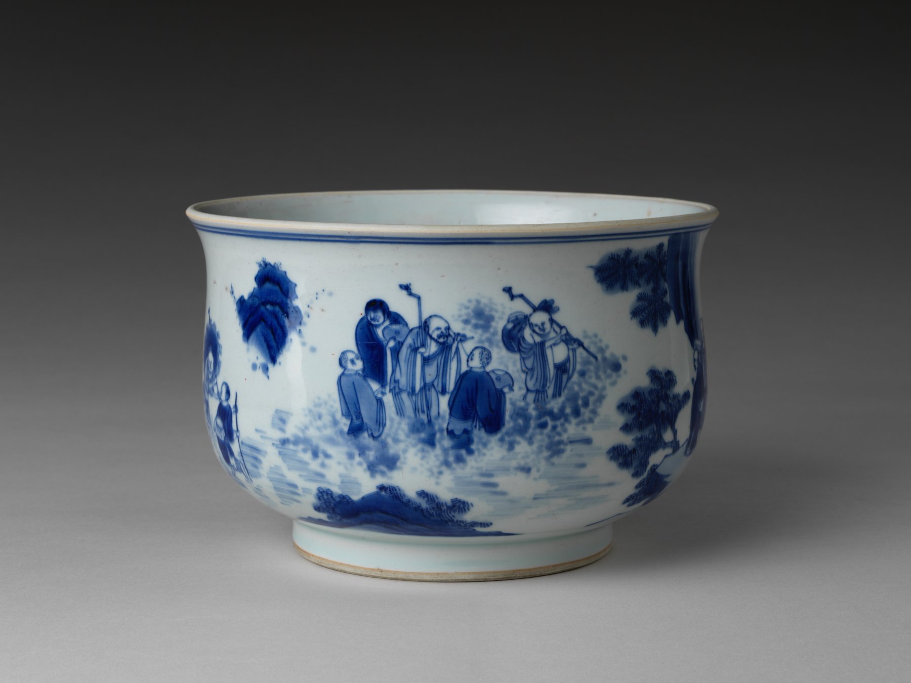 Incense Burner with the Eighteen Luohans: lư hương sứ trắng vẽ lam dưới men, quanh thân là các vị La Hán cưỡi hổ qua sông, gọi rồng và đi trên mây, Cảnh Đức Trấn, 1645