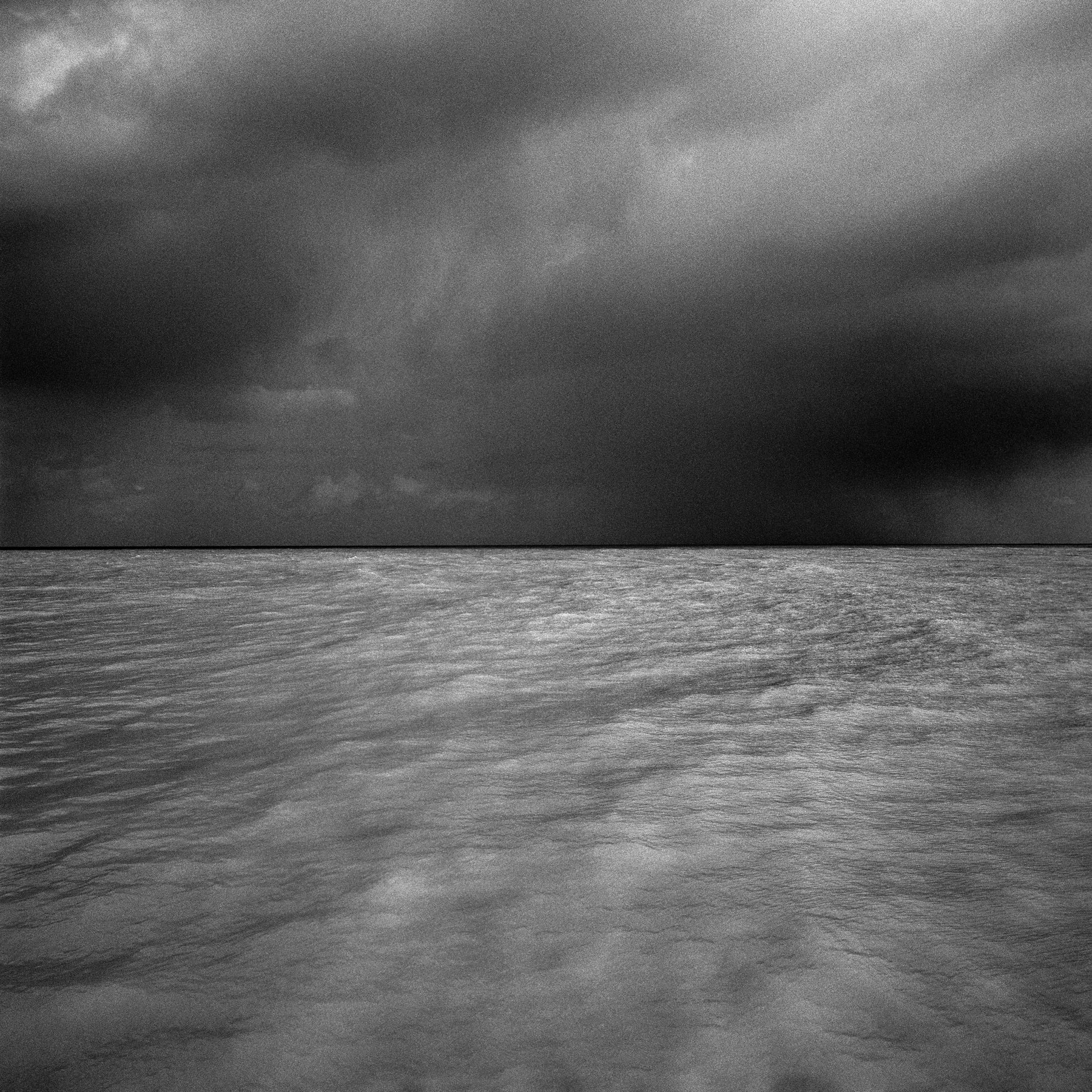 Mark Power, The Shipping Forecast: black and white photograph of a shore in one of the BBC sea areas