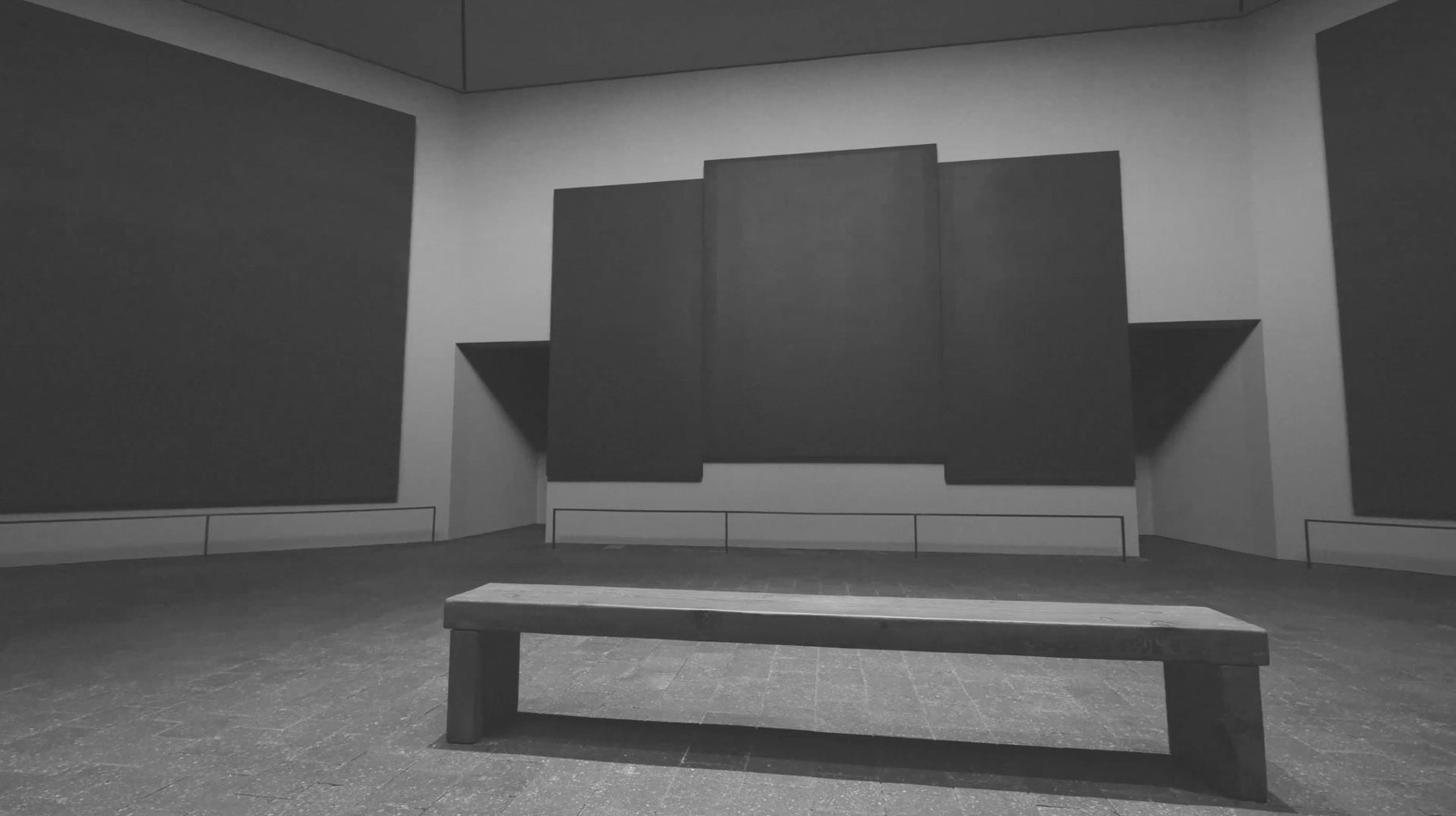 The Rothko Chapel in Houston: an octagonal room with Mark Rothko's large, near black purple paintings glowing in natural light