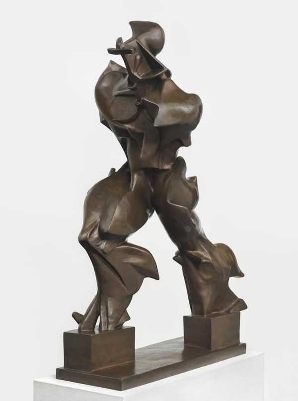 Umberto Boccioni, Unique Forms of Continuity in Space: a bronze striding figure, its body stretched into flowing masses as if windblown, standing on small blocks
